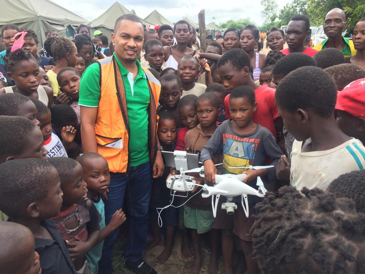 Flying drones often attracts attention from children in the area. Photo: WFP/Pedro Matos.